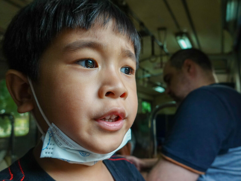 kid on a train